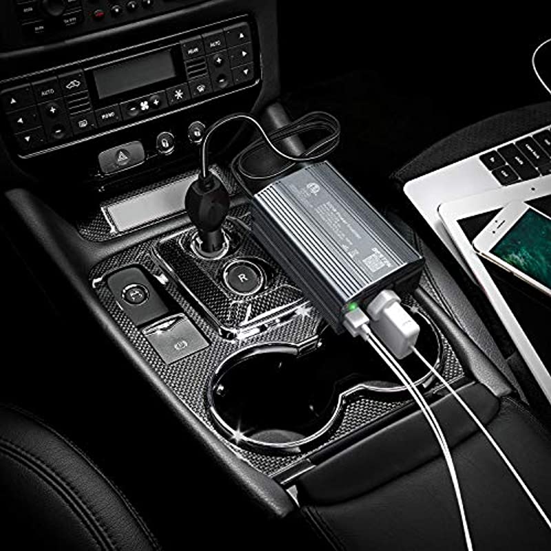 BESTEK 300W inverter — gray inverter charging connected devices in a car