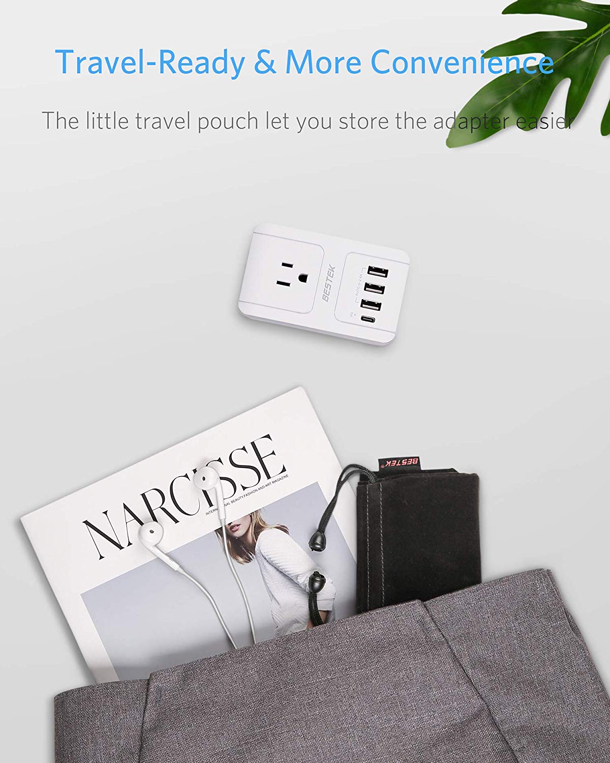 BESTEK travel plug adapter — compact adapter beside travel accessories