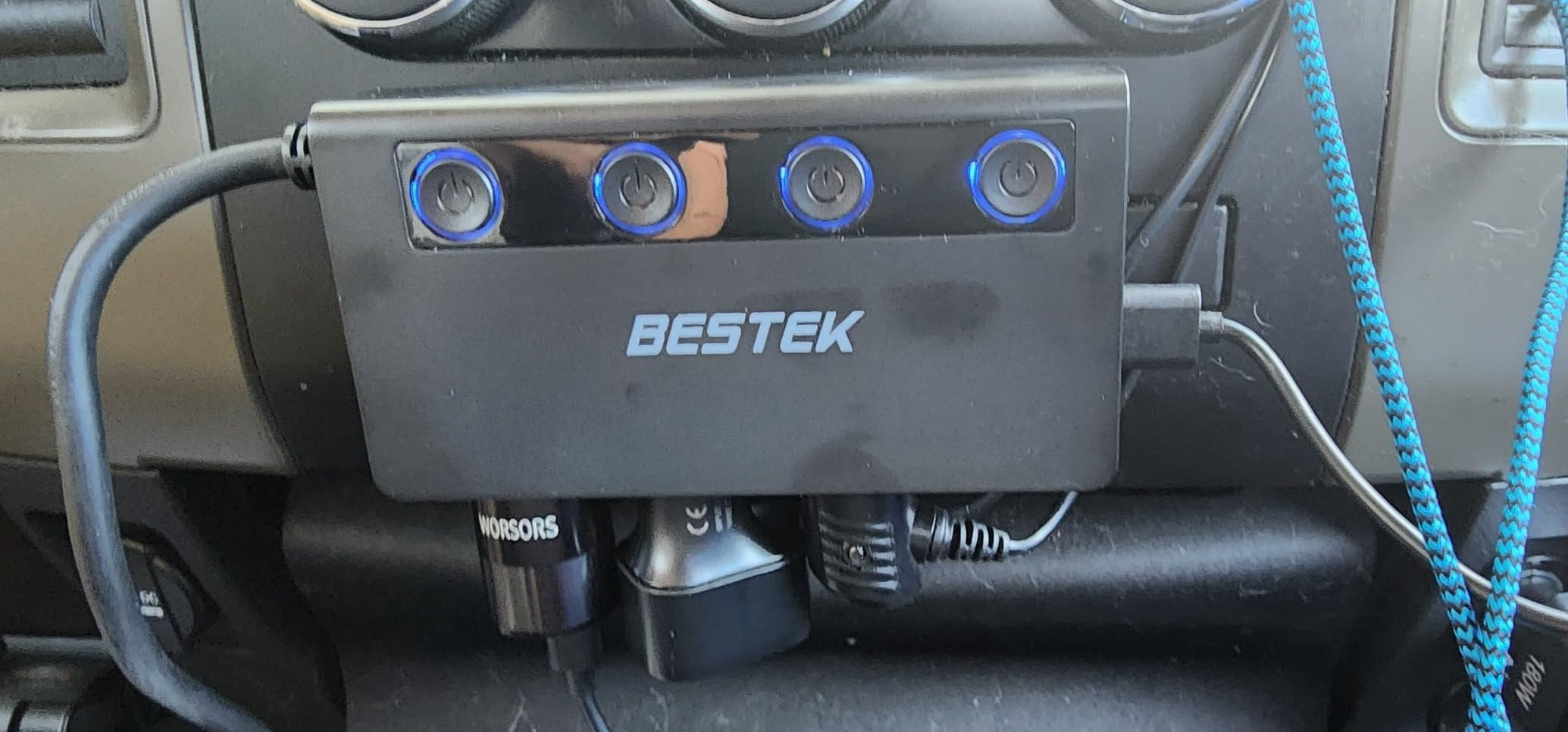 Review photo of a BESTEK car power splitter mounted in a vehicle.
